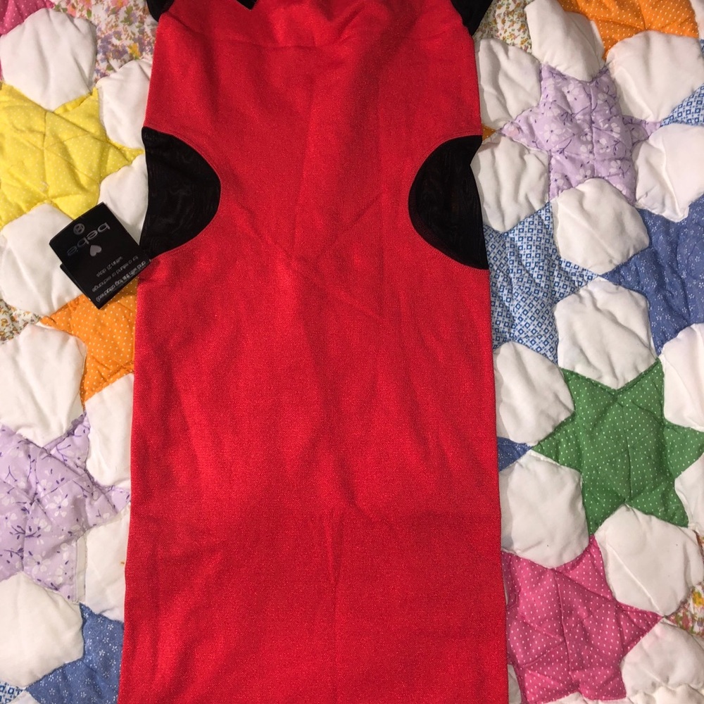 Brand new with tags Bebe dress medium